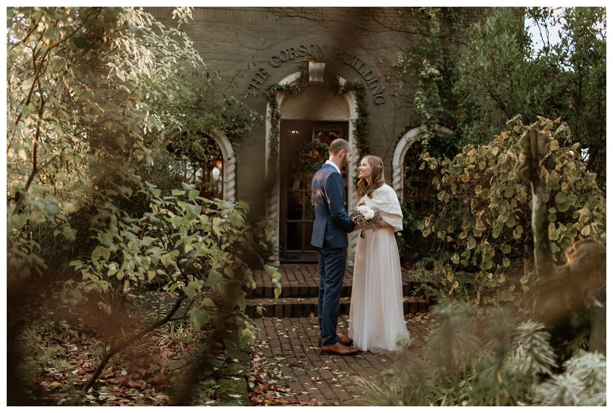 A romantic first look moment as the bride and groom stand together in a dreamy, intimate garden setting. This heartfelt exchange captures the magic of seeing each other before the ceremony—making couples wonder, "Should we do a first look on our wedding day?"