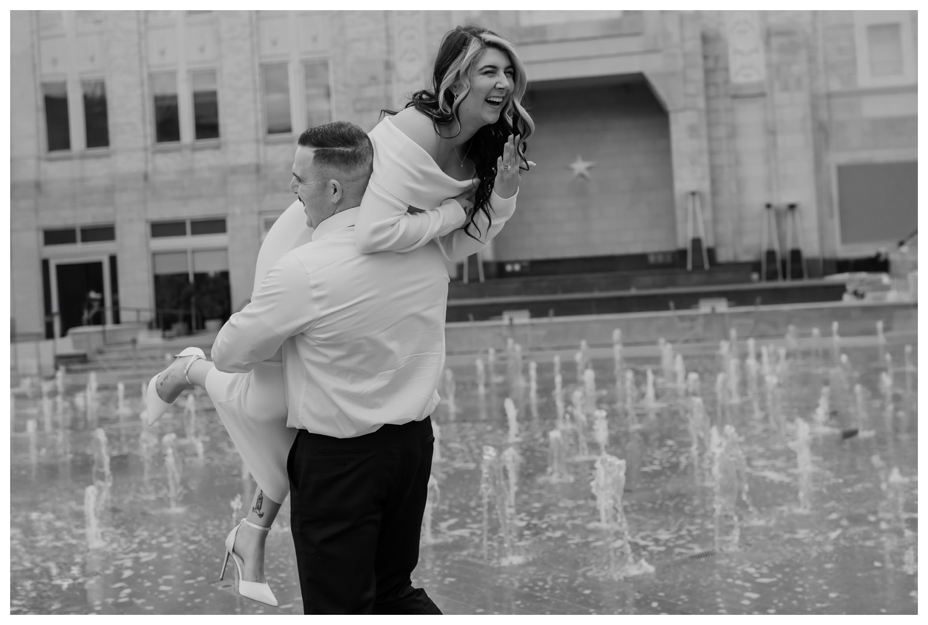 Playful engagement photos in downtown Fort Worth's Sundance Square