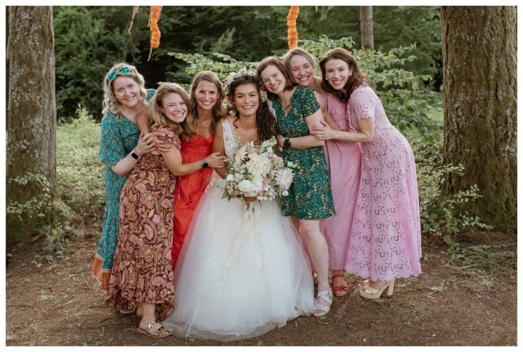 A bride and her cousins pose for a sweet wedding family photo, captured by a Fort Worth wedding photographer.